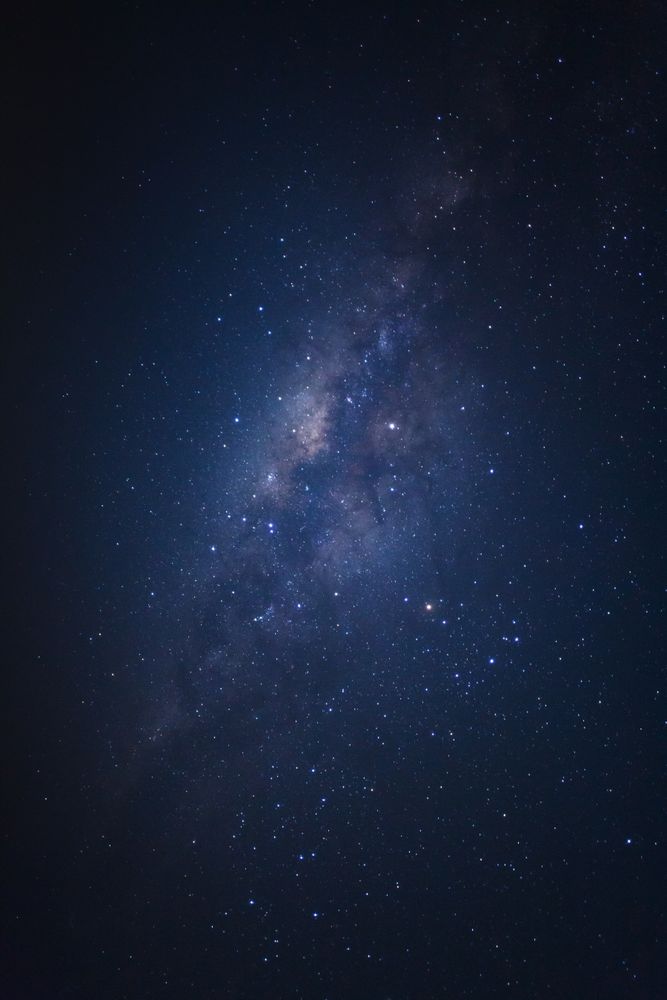 milky way galaxy and space dust in the universe, Long exposure photograph, with grain.