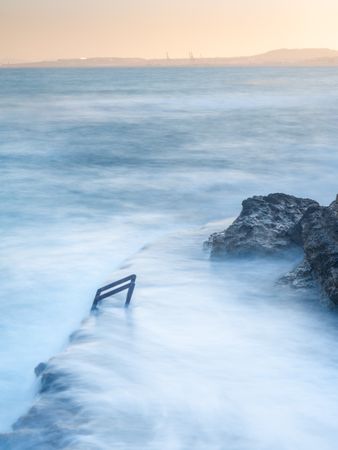 Cloudy fog over waving sea