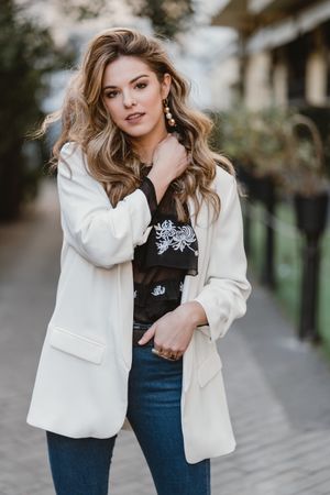 Charming woman posing on street