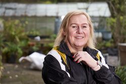 Portrait of older woman in garden