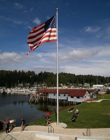 American flag over looking waterfront in Gig Harbor, Washington