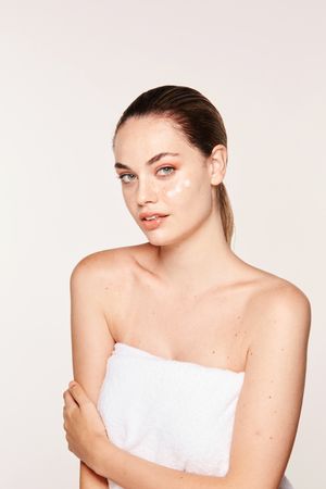 woman with cream on face
