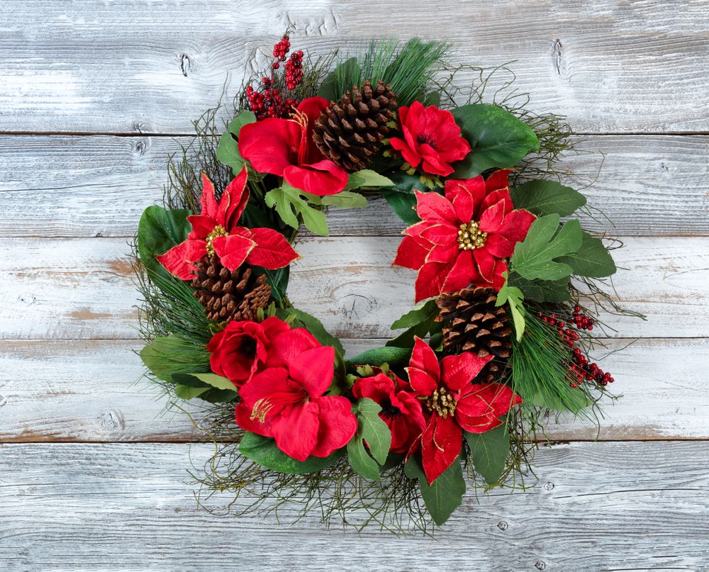 Large Traditional Christmas wreath on vintage wooden planks