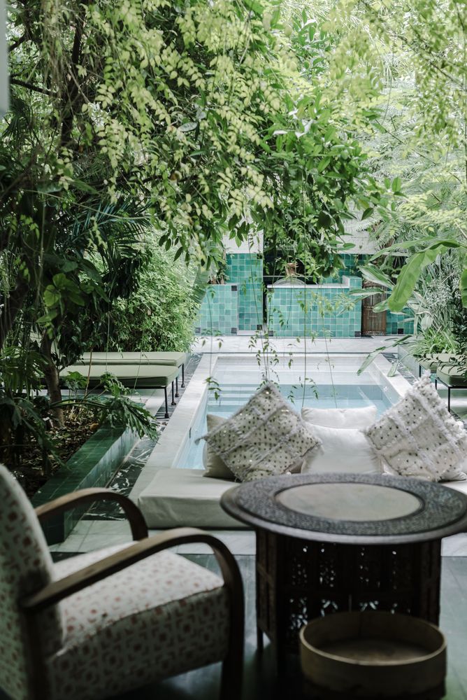 Soft bench near pool in garden
