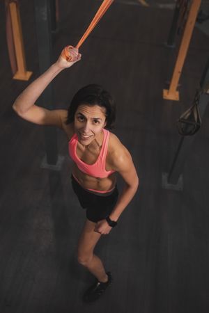 Athletic woman training in gym