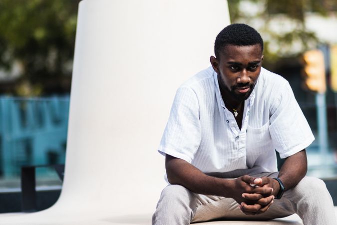 Stylish Black man in city street