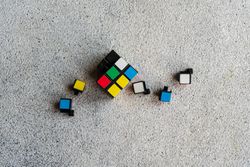 Rubik's cube details on the concrete background