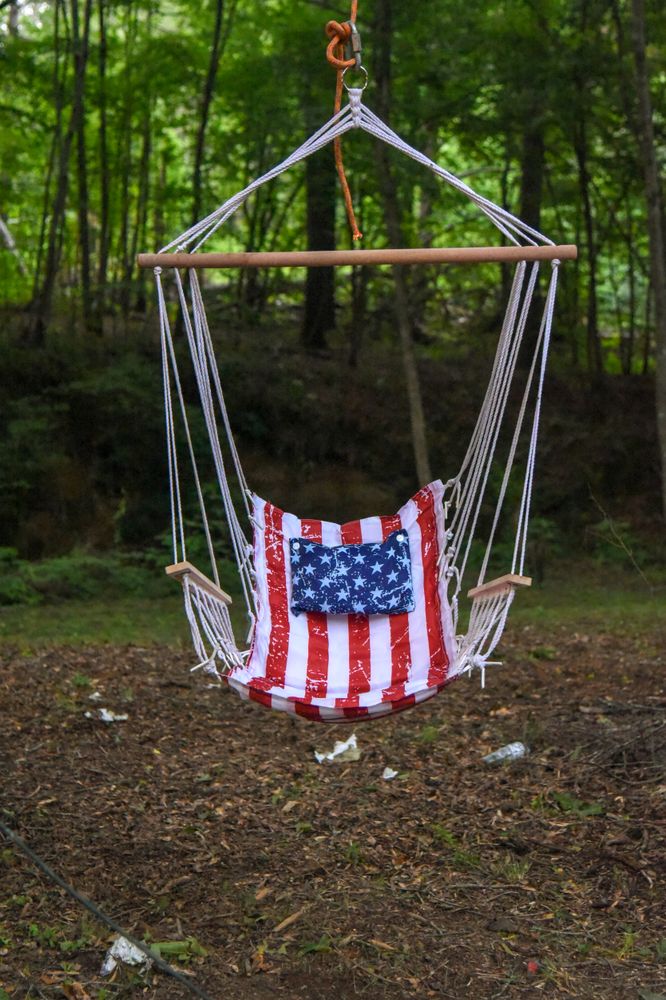 A swinging chair for lounging - colored in the American flag