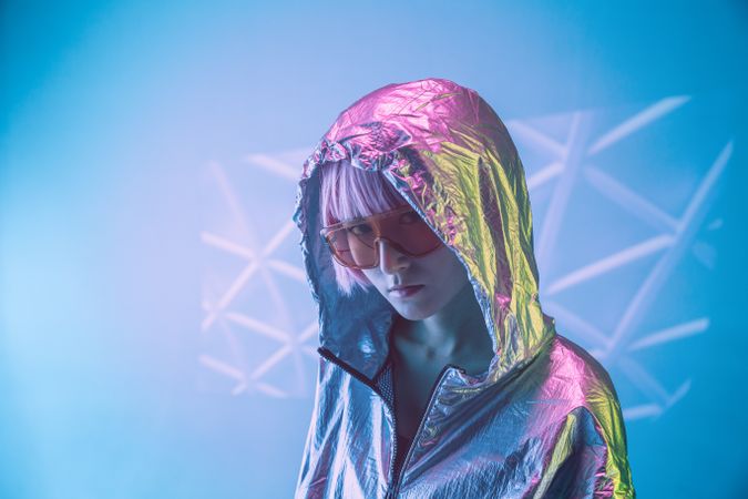 Woman standing in sparkly silver jacket