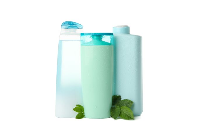 Blank bottles for cosmetics isolated on light background