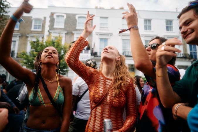 London, England, United Kingdom - August 28, 2022: Friends dancing at London street party