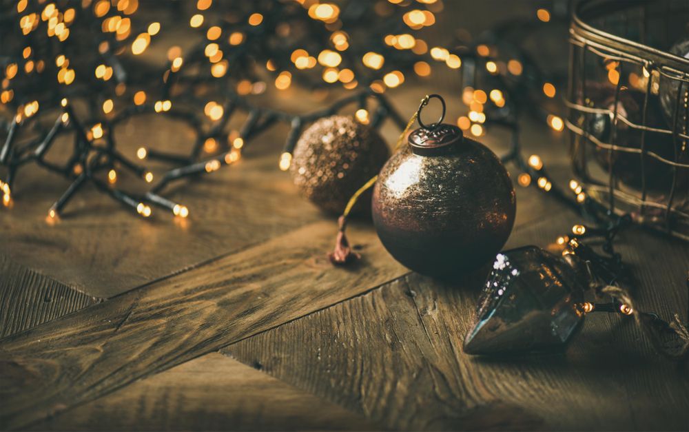 Christmas tree decorations, on wooden counter, close up,  with copy space