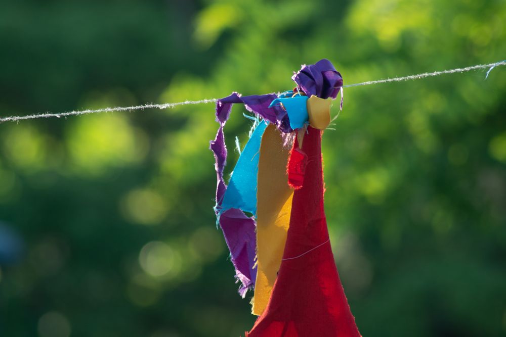 Strips of fabric on sunny line