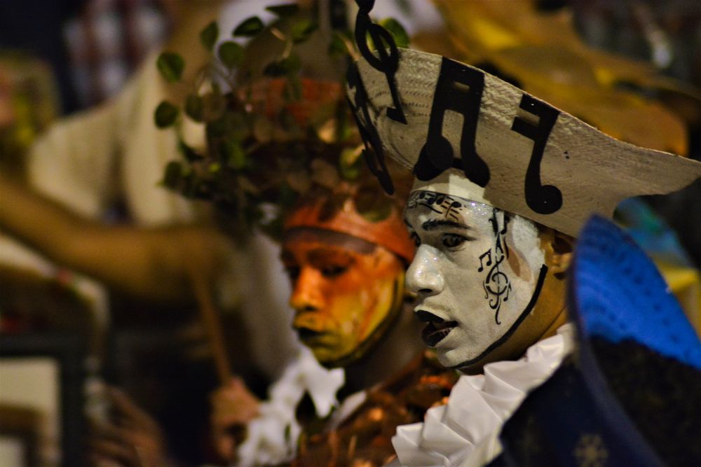 Two masked men for carnival in Montevideo