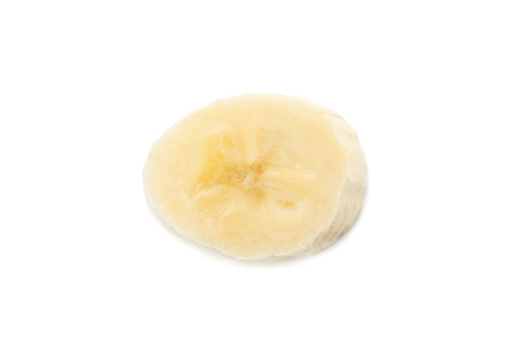 Banana slice isolated on blank background. Fresh fruit