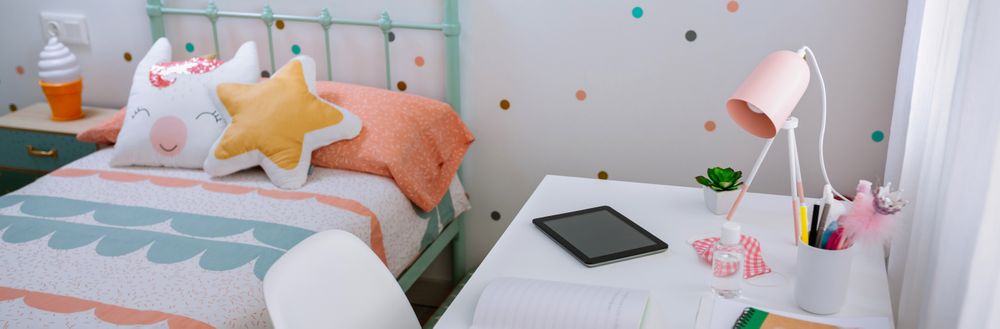 Girl's bedroom decorated in pastel colors