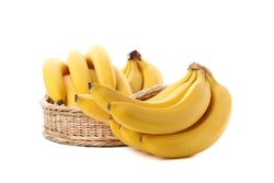 Banana cluster isolated on light background. Fresh fruit