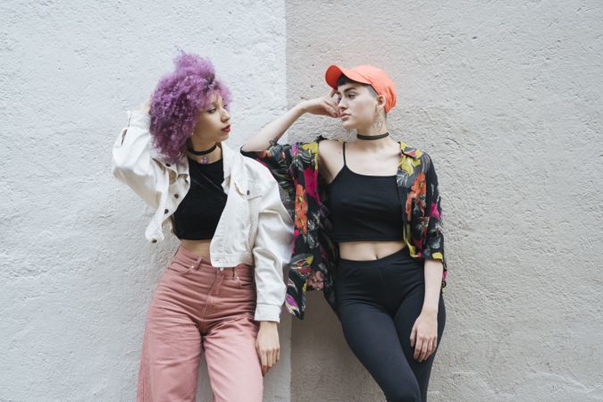 Women leaning and looking at each other