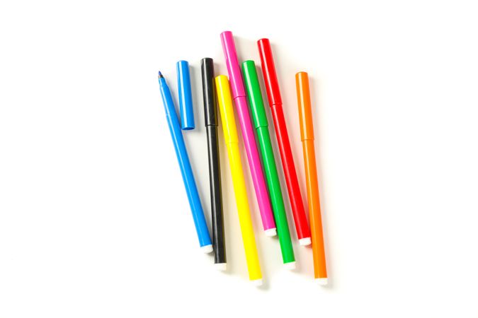 Color markers isolated on blank background, top view