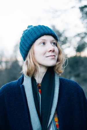 Woman in hat and scarf on cold day