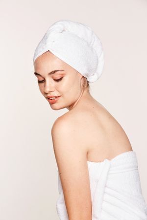 female with radiant body after cosmetic procedure