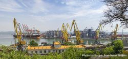 Yellow cranes by the Black sea at the Odessa seaport in Ukraine 4BrOd4