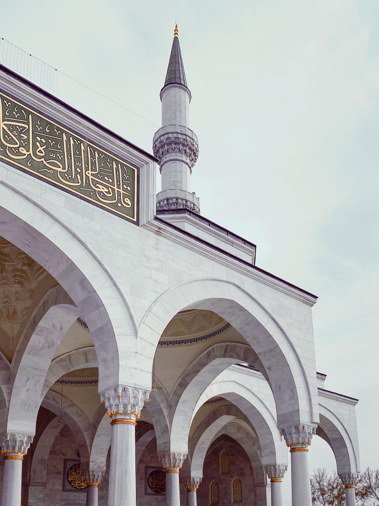 Arches and minaret of mosque