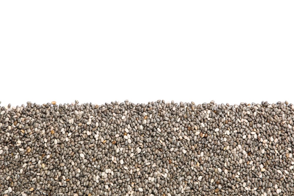 Chia seeds isolated on neutral background, top view