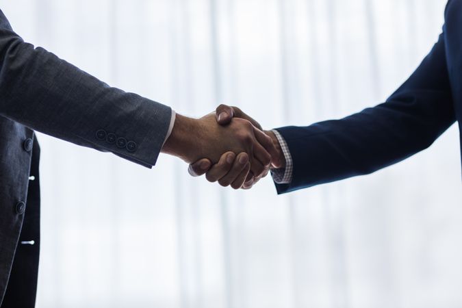 Successful business associates shaking hands