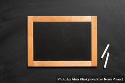 Wooden framed writing board surrounded with chalk 5w6gL0