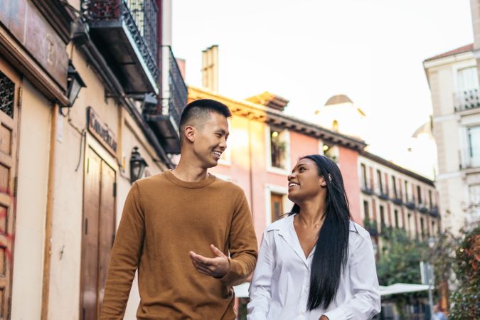Asian man and Black Latina woman on a date