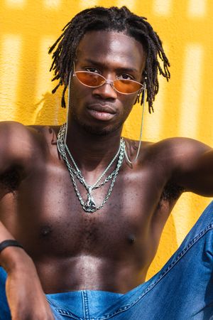 Stylish shirtless Black man