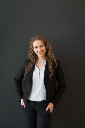 Gorgeous female posing in business suit