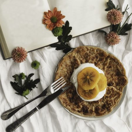Crepes with cream and persimmon