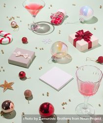 Scene of holiday items with wine glasses, presents, baubles and decorations 4d9LDb