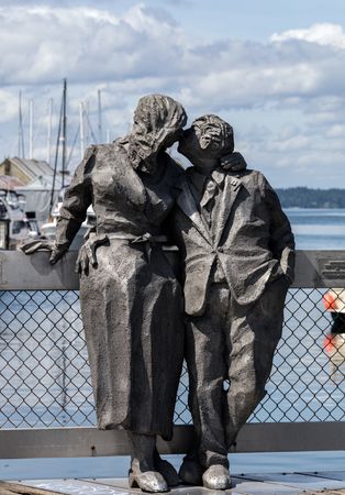 The Richard Beyer statue of the Kissing Couple on the harbor boardwalk in Olympia, Washington