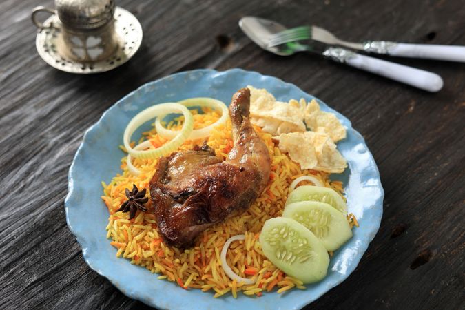 Nasi Kebuli Kabli Ayam Chicken Pilav on Blue Plate