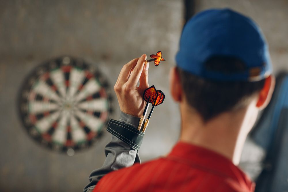 Man playing darts