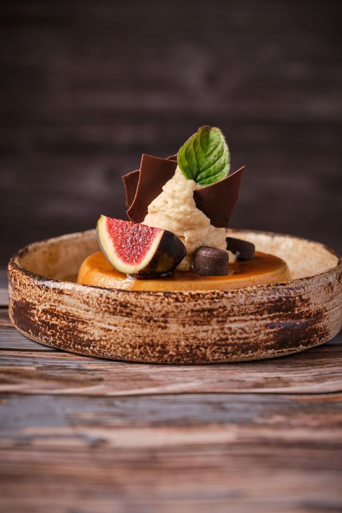Sweet cheesecake served in ceramic plate