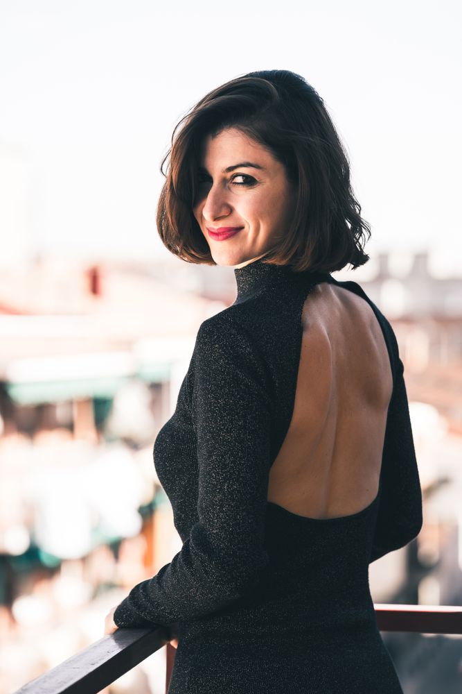 elegant woman on balcony