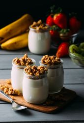 Glass bottles with milk and walnuts