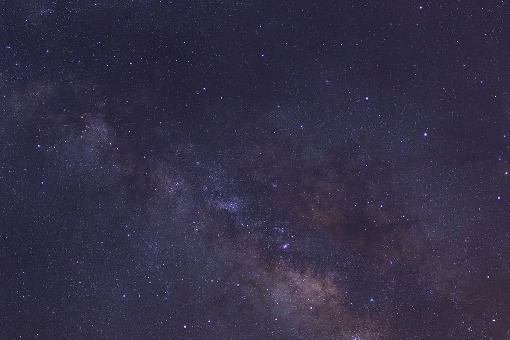 Starry night sky and milky way galaxy with stars and space dust in the universe