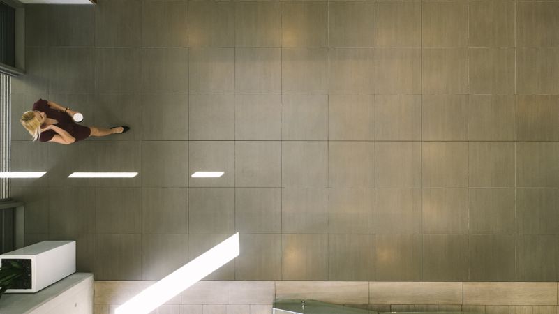 Businesswoman entering office hallway