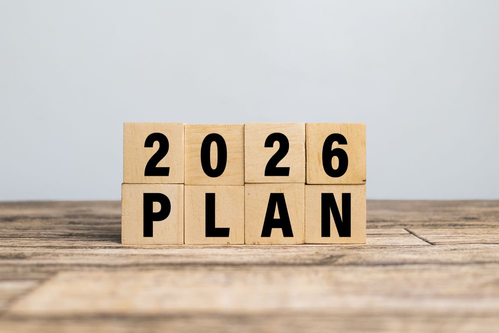 2026 plan words text on wooden blocks isolated on plain background