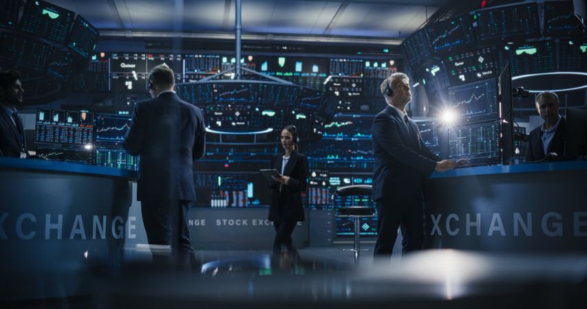 Group of Successful Stock Exchange Traders and Investors Using Sophisticated Computer Software to Monitor, Research and Predict Live Market Financial Data Behavior