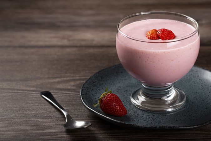 Delicious strawberry mousse in glass goblet.