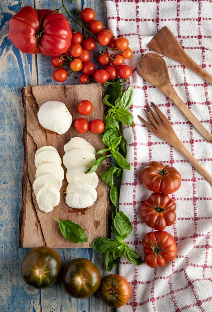 Salad ingredients on board and napkin