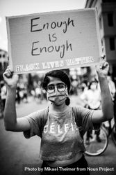 MONTREAL, QUEBEC, CANADA – June 7 2020- Woman holding a sign above her head at a BLM rally 0y7MW4