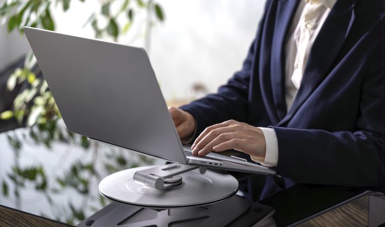 Businessman Working on Laptop at Office Desk