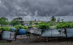 Metal barricade on cloudy day